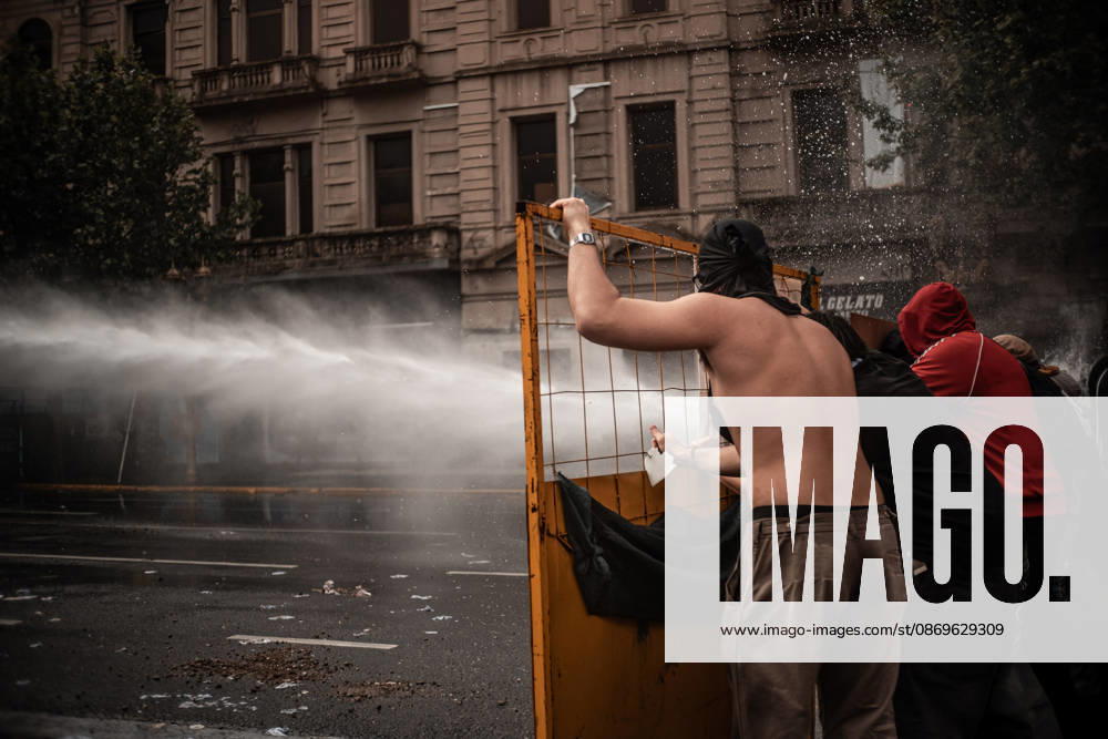 Police forces deploy tear gas, water cannon trucks and rubber bullets against demonstrators during the Fifth Federal University March near Congress, as protesters demand the implementation of the University Funding Law and oppose President Javier Mileis austerity policies. The protest takes place amid the governments broader deregulation agenda, including Decree 70 2023 Buenos Aires Argentina - ZUMAf175 20261015_zip_f175_027