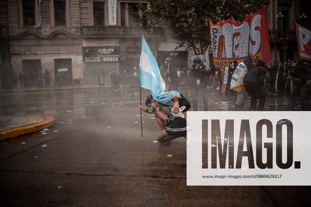 Police forces deploy tear gas, water cannon trucks and rubber bullets against demonstrators during the Fifth Federal University March near Congress, as protesters demand the implementation of the University Funding Law and oppose President Javier Mileis austerity policies. The protest takes place amid the governments broader deregulation agenda, including Decree 70 2023 Buenos Aires Argentina - ZUMAf175 20261015_zip_f175_030