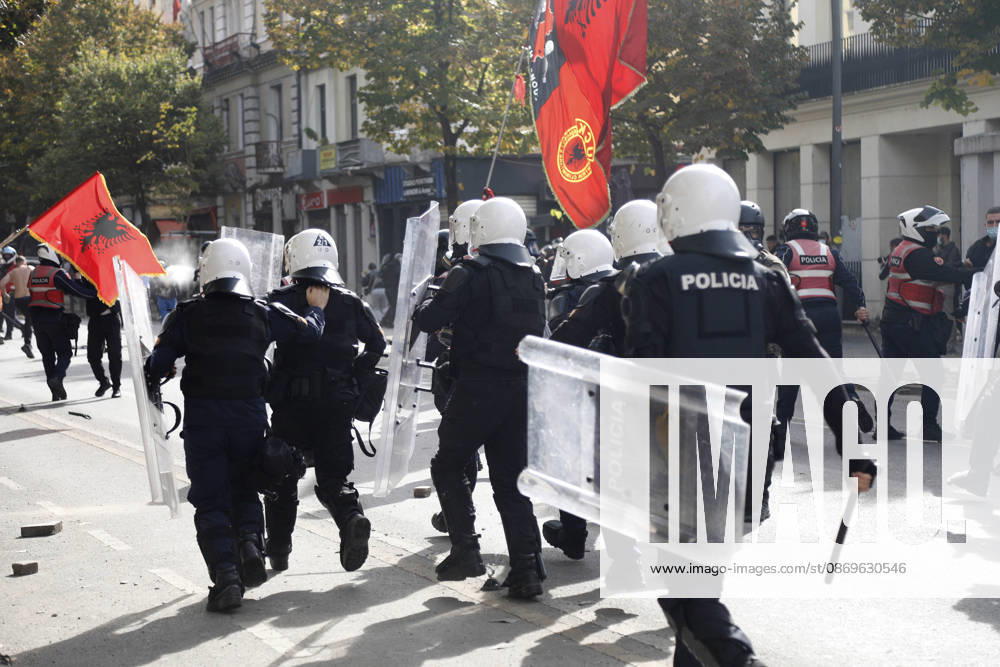 Protesters Clash with Police During a Demonstration in Tirana, Albania. Riot police officers clash with protesters during an anti-government demonstration in central Tirana on October 15, 2026, as protests continued for a third consecutive day over university conditions and demands for the resignation of Albanian Prime Minister Edi Rama. The latest rally follows two nights of violence in the capital, during which protesters and riot police clashed, police used water cannons and tear gas, and demonstrators damaged government offices and shops and set fire to several buildings. Light Studio Agency Malton Dibra Tirana Albania