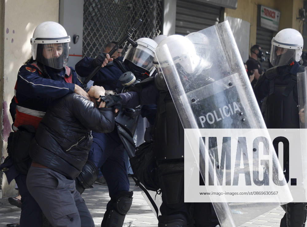 Protesters Clash with Police During a Demonstration in Tirana, Albania. Riot police detain a protester during an anti-government demonstration in central Tirana on October 15, 2026, as protests continued for a third consecutive day over university conditions and demands for the resignation of Albanian Prime Minister Edi Rama. The latest rally follows two nights of violence in the capital, during which protesters and riot police clashed, police used water cannons and tear gas, and demonstrators damaged government offices and shops and set fire to several buildings. Light Studio Agency Malton Dibra Tirana Albania