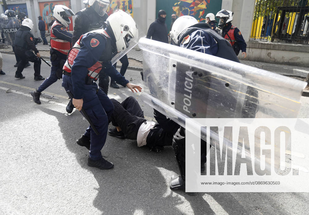 Protesters Clash with Police During a Demonstration in Tirana, Albania. Riot police detain a protester during an anti-government demonstration in central Tirana on October 15, 2026, as protests continued for a third consecutive day over university conditions and demands for the resignation of Albanian Prime Minister Edi Rama. The latest rally follows two nights of violence in the capital, during which protesters and riot police clashed, police used water cannons and tear gas, and demonstrators damaged government offices and shops and set fire to several buildings. Light Studio Agency Malton Dibra Tirana Albania