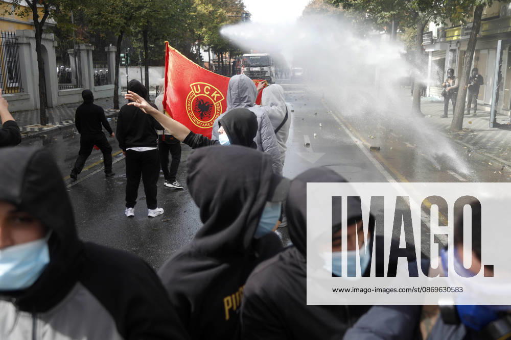 Protesters Clash with Police During a Demonstration in Tirana, Albania. Protesters throw stones at riot police during an anti-government demonstration in central Tirana on October 15, 2026, as protests continued for a third consecutive day over university conditions and demands for the resignation of Albanian Prime Minister Edi Rama. The latest rally follows two nights of violence in the capital, during which protesters and riot police clashed, police used water cannons and tear gas, and demonstrators damaged government offices and shops and set fire to several buildings. Light Studio Agency Malton Dibra Tirana Albania