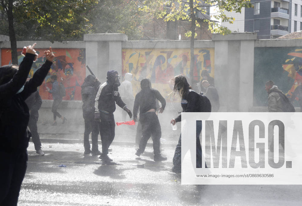 Protesters Clash with Police During a Demonstration in Tirana, Albania. Protesters throw stones at riot police during an anti-government demonstration in central Tirana on October 15, 2026, as protests continued for a third consecutive day over university conditions and demands for the resignation of Albanian Prime Minister Edi Rama. The latest rally follows two nights of violence in the capital, during which protesters and riot police clashed, police used water cannons and tear gas, and demonstrators damaged government offices and shops and set fire to several buildings. Light Studio Agency Malton Dibra Tirana Albania