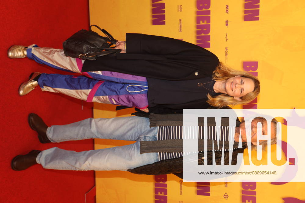 Antje Riis and Winfried Glatzeder at the premiere of the documentary *Biermann* at Kino International in Berlin