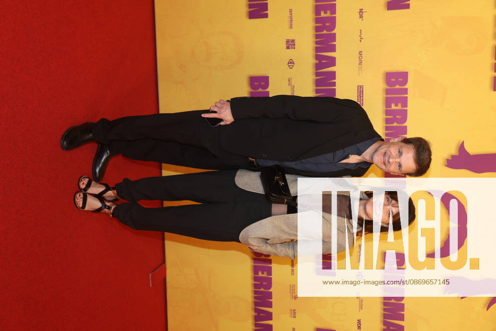 Benjamin Herrmann and Caroline Rosales at the premiere of the documentary *Biermann* at Kino International in Berlin