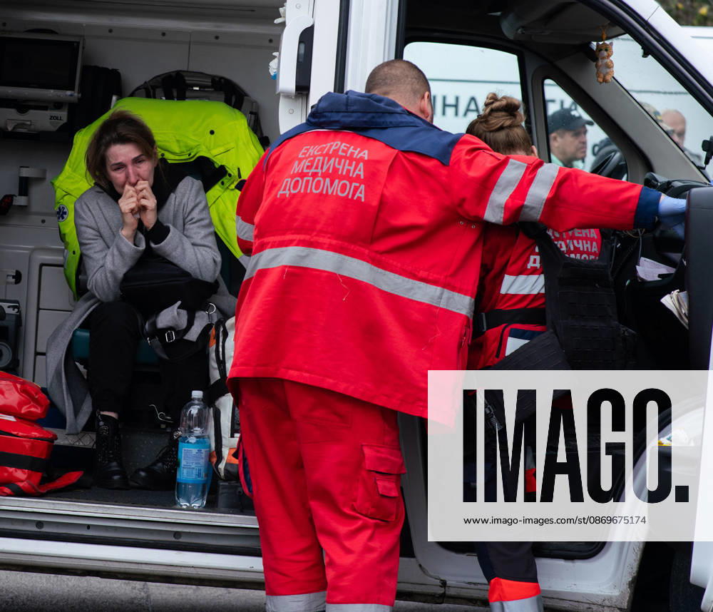 Drone attack on street market in Kharkiv kills 2, injures 13 KHARKIV, UKRAINE - OCTOBER 16: A woman sits inside an ambulance as emergency medical personnel provide assistance following a drone attack on a street market in Kharkiv, Ukraine, on October 16, 2026. The attack killed two people and injured 13 others. Carlo Bravo Anadolu Kharkiv Ukraine. Editorial use only. Please get in touch for any other usage.