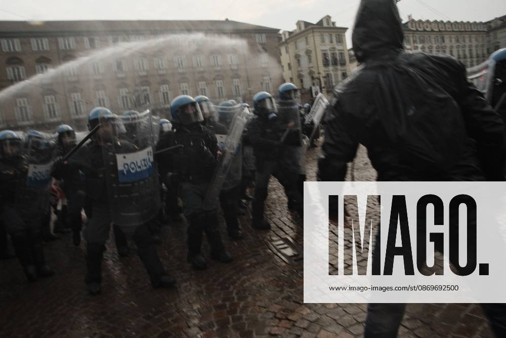 TURIN, ITALY, OCTOBER 16, 2026: Students demonstrate against deteriorating school buildings, insufficient education funding and job insecurity, calling for greater investment in education rather than military spending. Clashes break out in Piazza Castello, where police use water cannons and charge demonstrators. Earlier along the route, teachers link arms between students and police to prevent confrontation. Turin Italy - ZUMAq101 20261016_zna_q101_136