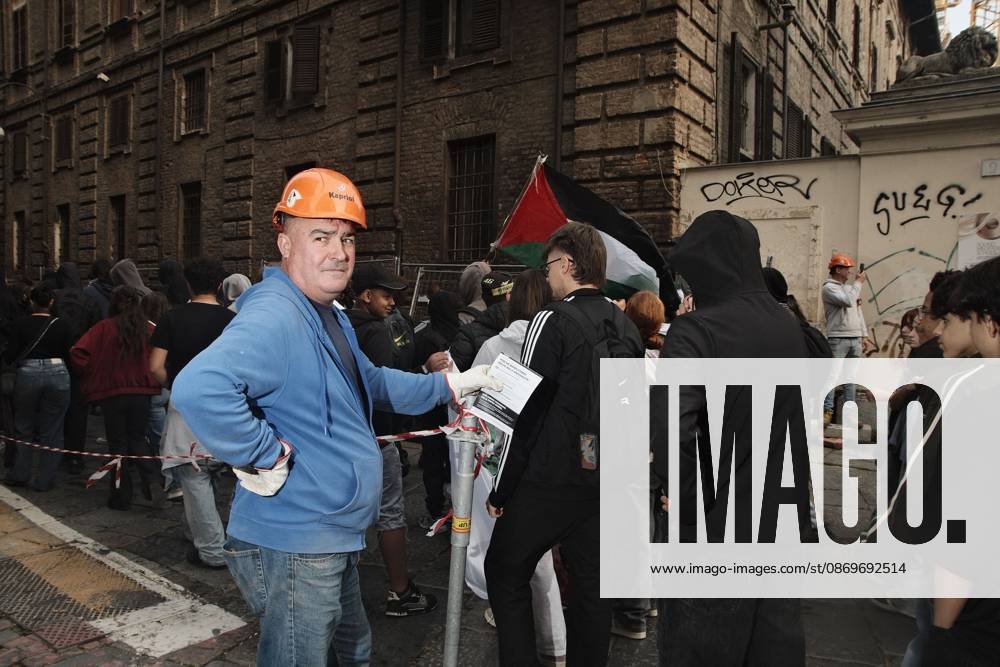 TURIN, ITALY, OCTOBER 16, 2026: Students demonstrate against deteriorating school buildings, insufficient education funding and job insecurity, calling for greater investment in education rather than military spending. Clashes break out in Piazza Castello, where police use water cannons and charge demonstrators. Earlier along the route, teachers link arms between students and police to prevent confrontation. Turin Italy - ZUMAq101 20261016_zna_q101_140