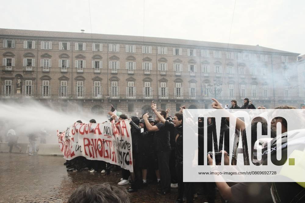 TURIN, ITALY, OCTOBER 16, 2026: Students demonstrate against deteriorating school buildings, insufficient education funding and job insecurity, calling for greater investment in education rather than military spending. Clashes break out in Piazza Castello, where police use water cannons and charge demonstrators. Earlier along the route, teachers link arms between students and police to prevent confrontation. Turin Italy - ZUMAq101 20261016_zna_q101_147