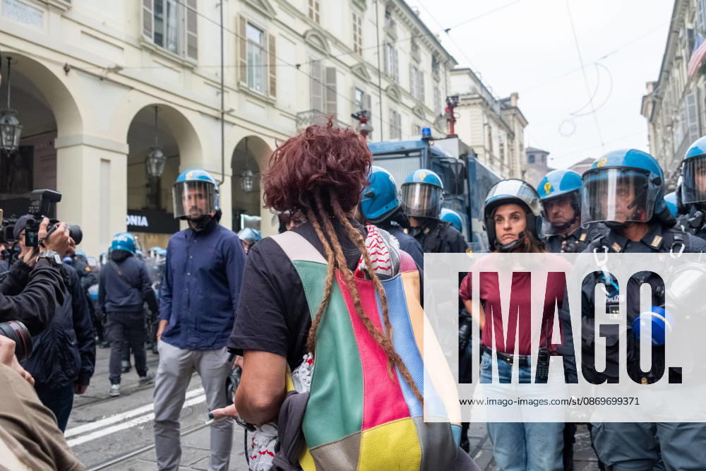 Reportage - Student strike in Turin A woman trying to mediate with the police during Student strike in Turin, Reportage in Turin, Italy, October 16 2026 Turin City of Turin Italy