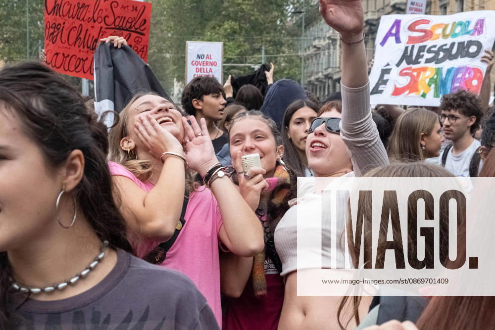 IPA89764436 - Some female students singing during the march at the student strike in Turin; Report from Turin, Italy