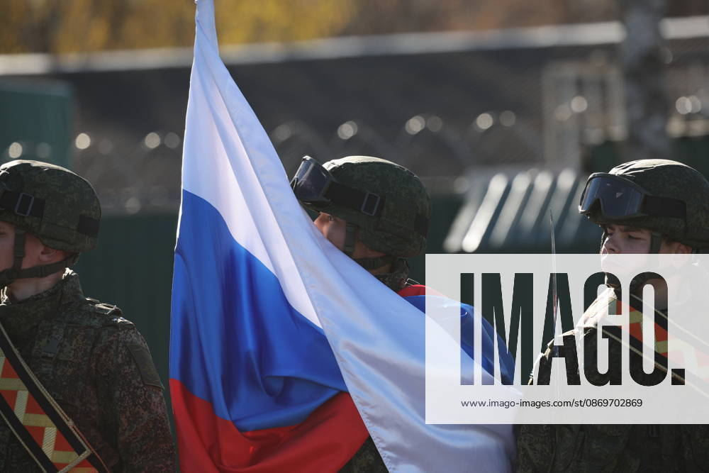 Servicemen appear with a national flag of Russia in the final live training phase of the Indestructible Brotherhood 2026 command-and-staff military exercise by the CSTO Peacekeeping Forces at the Losvido military training ground Belarus - ZUMAt113 20261016_zaa_t113_294