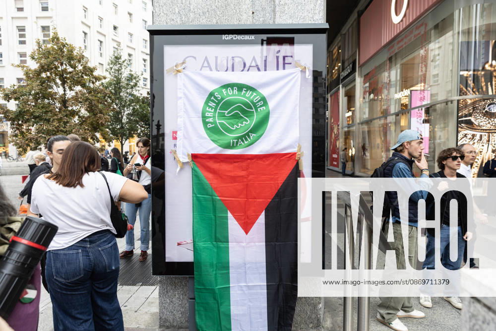 IPA89767316 - Milan, October 16, 2026, Piazza San Babila, Fridays for Future Italy rally, global climate strike, climate and environmental activists in the photo: Palestinian flag