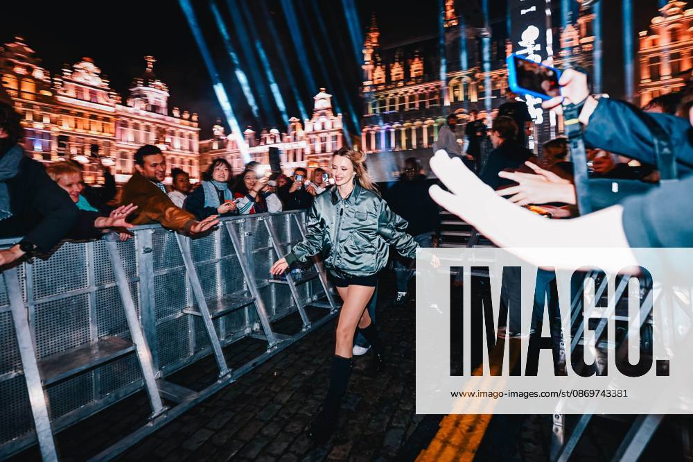 Belgian singer Angele pictured during the Angele Instinct Release Party , a surprise party organized by the Brussels singer to celebrate the release of her album Instinct at the Grote Markt Grand Place, in Brussels, Friday 16 October 2026. EMILExWINDAL 190036474