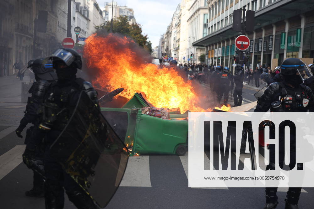 Clashes Erupt Prior To The High Cost of Living Protest - Paris Protesters erect barricades while the French Republican Security Corps (CRS – Compagnies Républicaines de Securite) and BRAV-M troops respond during clashes prior to the start of a demonstration protesting against the high cost of living at Rue Saint Denis, near Place de la Republique in Paris on October 17, 2026 as part of a nationwide call for mobilisation bringing together various groups expressing their anger: former Yellow Vests , secondary school and university students, climate activists and even farmers. After weeks of student protests, France faces broader, nationwide demonstrations on October 17, 2026 over the cost of living, setting up a potentially fraught six mont
