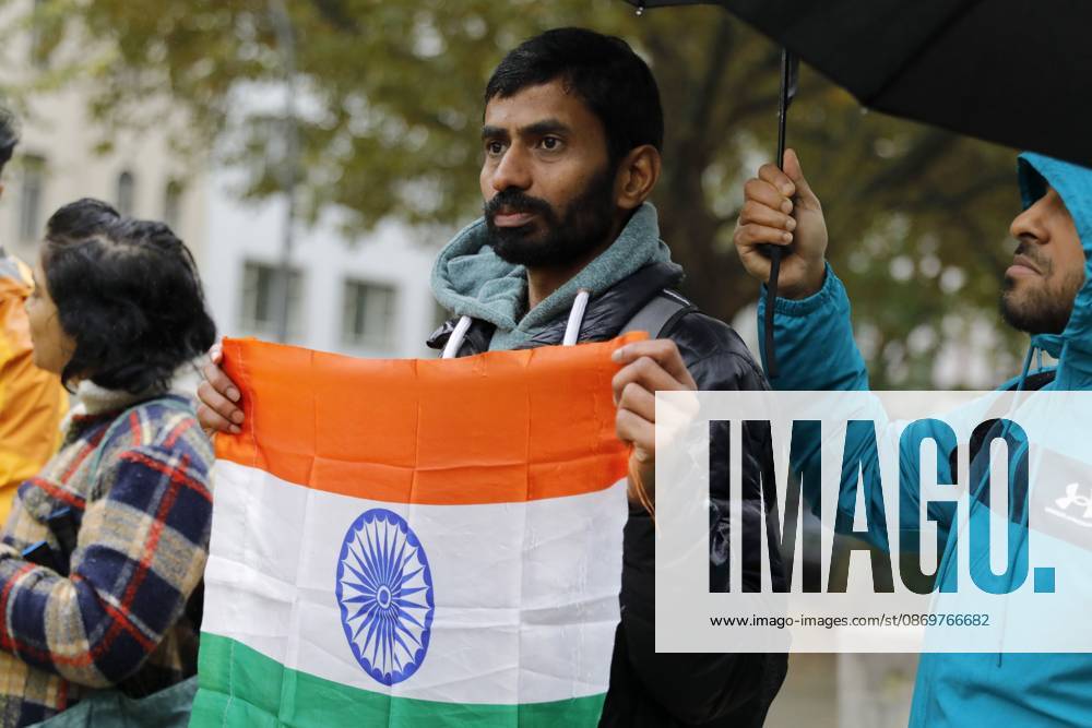 BERLIN, GERMANY - OCTOBER 17, 2026: A small group of demonstrators hold placards at Oranienplatz in the Kreuzberg district to show solidarity with mass protests in India and to protest against the crackdown on them, as several people take the floor to discuss the situation. The demonstration followed a call by Neha Bora, president of the All India Studentsâ€⠢ Association (AISA), for people everywhere to back the protests, saying â€oeeverywhere is Jantar Mantarâ€Â, the site in Delhi where the main protests are taking place. The protests demand the resignation of Chief Election Commissioner Gyanesh Kumar over a revision of electoral rolls that opponents say led to the mass deletion of voters, whi - ZUMAq101 20261017_zna_q101_071