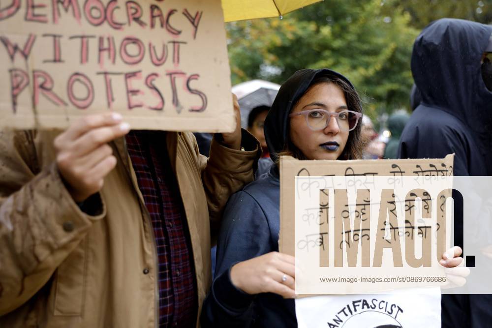 BERLIN, GERMANY - OCTOBER 17, 2026: A small group of demonstrators hold placards at Oranienplatz in the Kreuzberg district to show solidarity with mass protests in India and to protest against the crackdown on them, as several people take the floor to discuss the situation. The demonstration followed a call by Neha Bora, president of the All India Studentsâ€⠢ Association (AISA), for people everywhere to back the protests, saying â€oeeverywhere is Jantar Mantarâ€Â, the site in Delhi where the main protests are taking place. The protests demand the resignation of Chief Election Commissioner Gyanesh Kumar over a revision of electoral rolls that opponents say led to the mass deletion of voters, whi - ZUMAq101 20261017_zna_q101_073