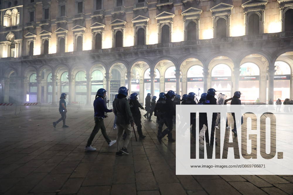 IPA89813355 - Milan, October 17, 2026: Italia in Piazza demonstration; violent clashes between police and the student movement; a construction site in Piazza Duomo set on fire