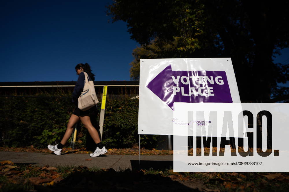 A woman walks past a sign directing people to a polling station in Vancouver, on Saturday Oct. 17, 2026. British Columbians are heading to the polls to cast their votes in municipal elections being held across the province. Port Moody CANADA - ZUMAc35_ 20261017_zaf_c35_016