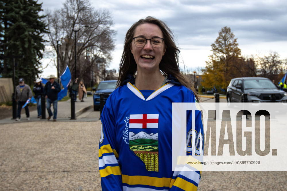 Maycee Holmes of the podcast series At Home with Holmes, smiles during an Alberta independence rally at the Alberta legislature, in Edmonton on Saturday, Oct. 17, 2026. Edmonton Canada - ZUMAc35_ 20261017_zaf_c35_041