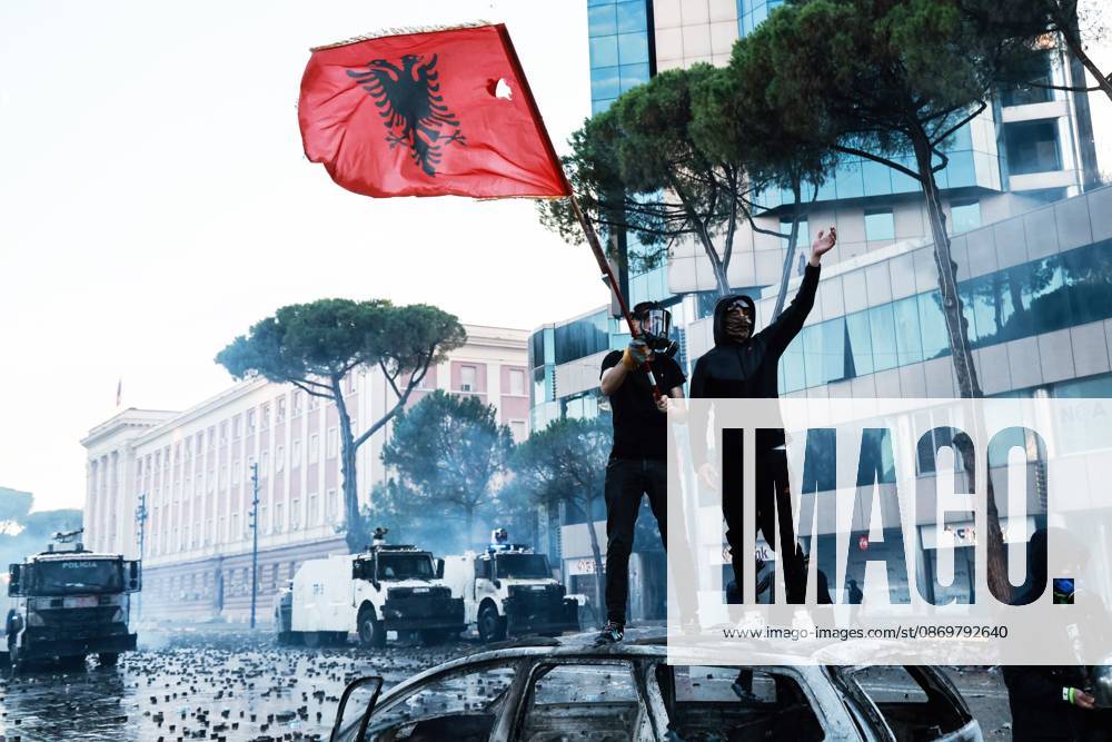 Fires And Clashes In Tirana TIRANA, ALBANIA, OCTOBER 17, 2026: Demonstrators clash with riot police near the Prime Ministers Office during student-led anti-government protests in central Tirana. Protesters throw stones and pyrotechnics, while police use tear gas, water cannons and rubber bullets. Fires break out at the High Court and the entrance to a Bank of Albania building as unrest continues for a fifth consecutive day. Demonstrators demand better university conditions and the resignation of Prime Minister Edi Rama. Tirana Albania