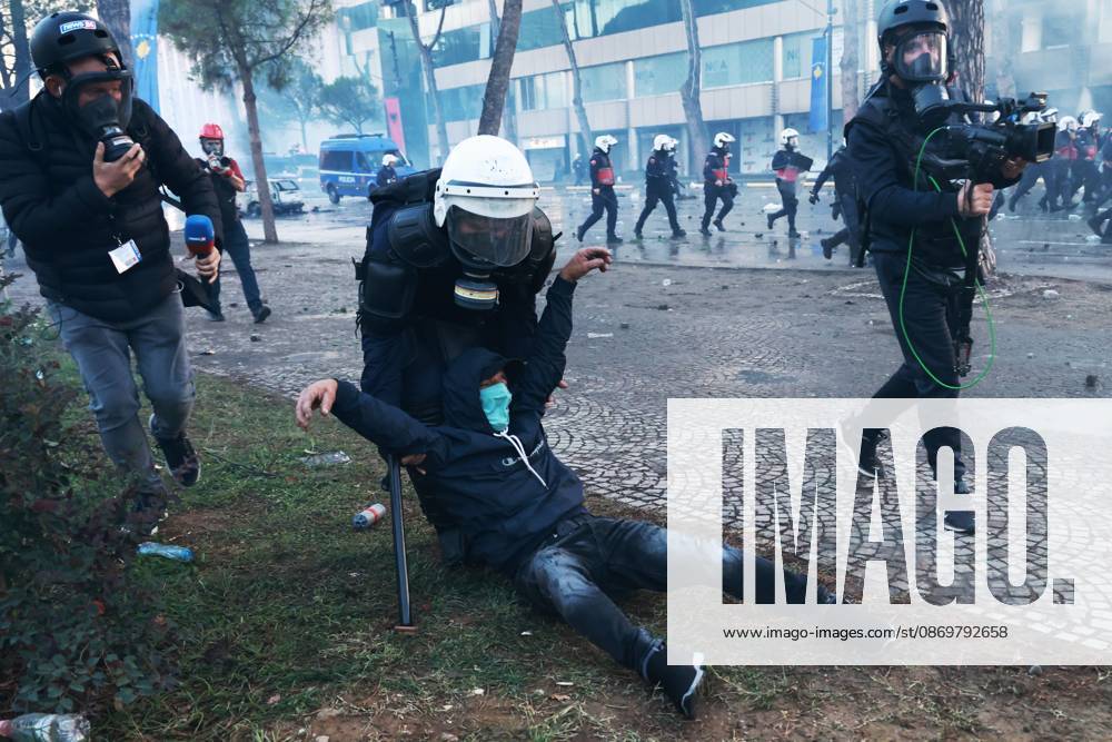 Fires And Clashes In Tirana TIRANA, ALBANIA, OCTOBER 17, 2026: Demonstrators clash with riot police near the Prime Ministers Office during student-led anti-government protests in central Tirana. Protesters throw stones and pyrotechnics, while police use tear gas, water cannons and rubber bullets. Fires break out at the High Court and the entrance to a Bank of Albania building as unrest continues for a fifth consecutive day. Demonstrators demand better university conditions and the resignation of Prime Minister Edi Rama. Tirana Albania