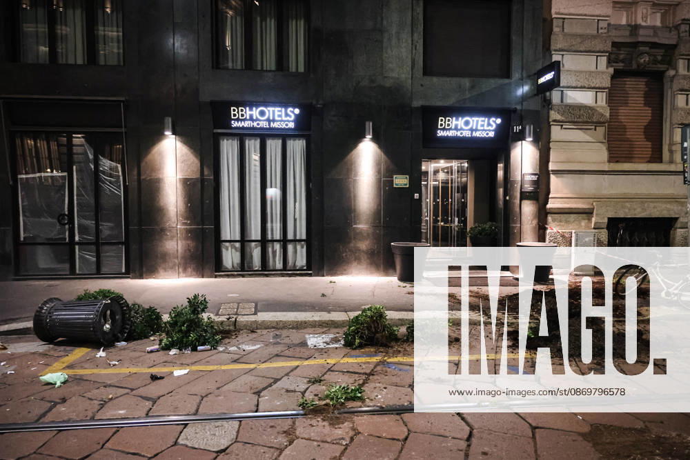 IPA89830558 - Milan: Damage caused by clashes between protesters and police during the Italia in Piazza demonstration against the high cost of living in the city center. Pictured: Damage on Missori Street