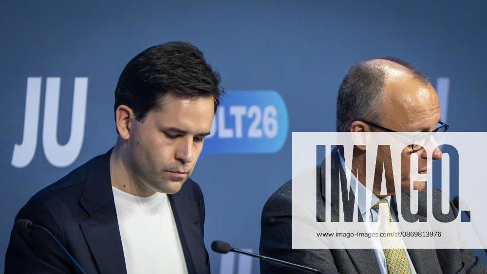 Johannes Winkel, the JU Federal Chairman who was re-elected the previous day with a record 94.6 percent of the vote, stands on stage with Federal Chancellor Friedrich Merz (from left) after the chancellor’s speech at Deutschlandtag 78 in Bonn. Deutschlandtag 2026 in Bonn. Junge Union (JU), the youth organization of the CDU and CSU, Bonn, North Rhine-Westphalia, Germany, World Conference Cen