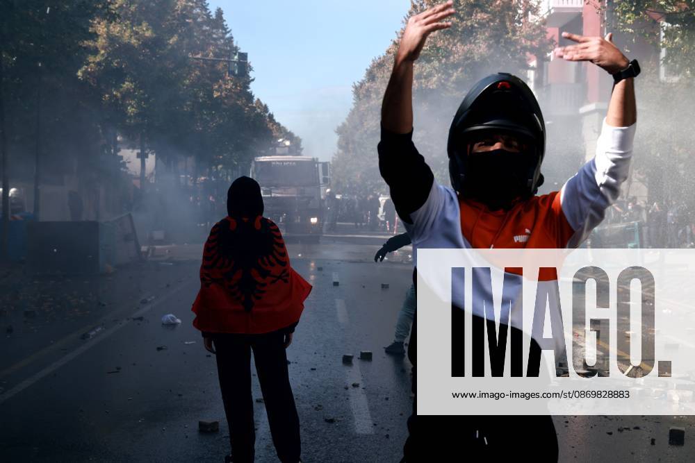 Tirana Clashes Enter Fifth Day TIRANA, ALBANIA, OCTOBER 17, 2026: Demonstrators clash with riot police outside the Ministry of Education during student-led anti-government protests in Tirana. Police deploy tear gas as protesters throw stones during a fifth consecutive day of unrest. Demonstrators demand improved university conditions and the resignation of Prime Minister Edi Rama. Tirana Albania