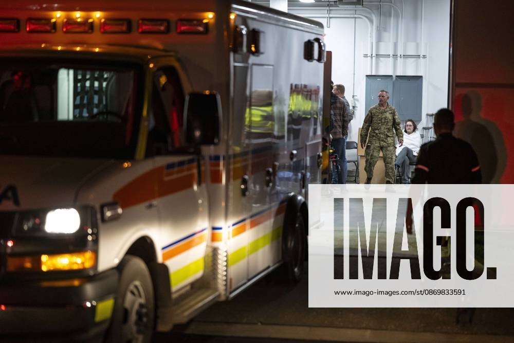 Emergency crews and military personnel at the Wainwright Health Centre as injured military members are treated after a fire at CFB Wainwright, outside of Wainwright, Alta., on Saturday, Oct. 17, 2026. Wainwright Canada - ZUMAc35_ 20261017_zaf_c35_152