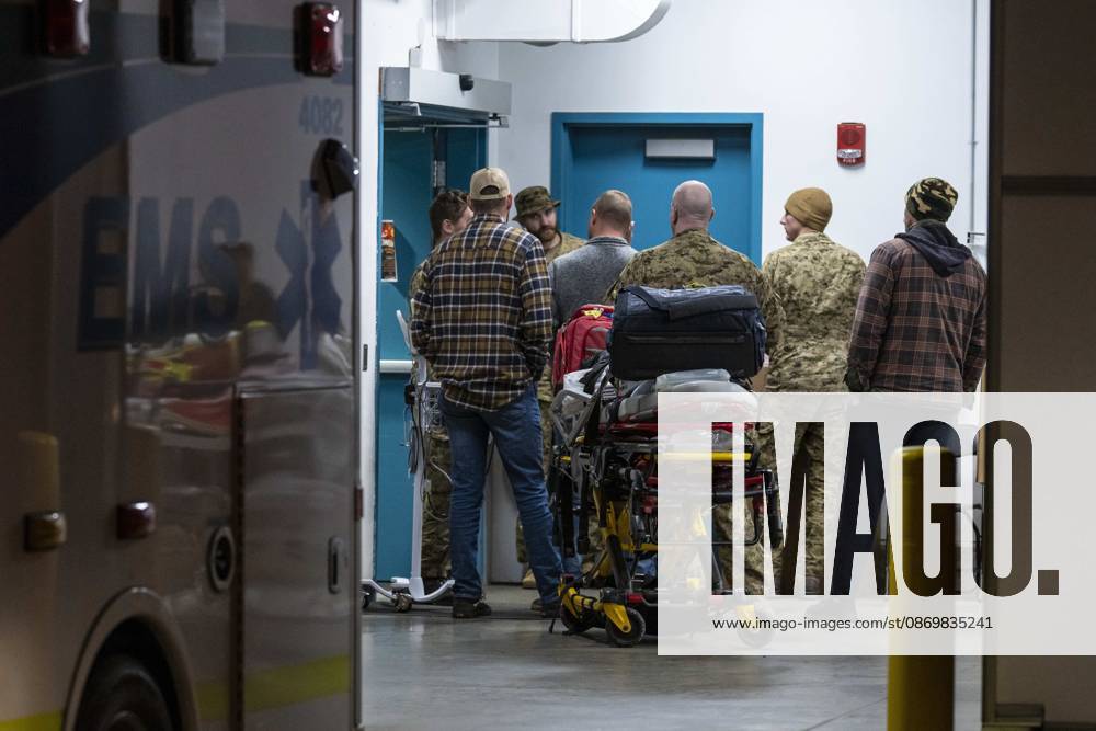 Emergency crews and military personnel at the Wainwright Health Centre as injured military members are treated after a fire at CFB Wainwright, outside of Wainwright, Alta., on Saturday, Oct. 17, 2026. Wainwright Canada - ZUMAc35_ 20261017_zaf_c35_158