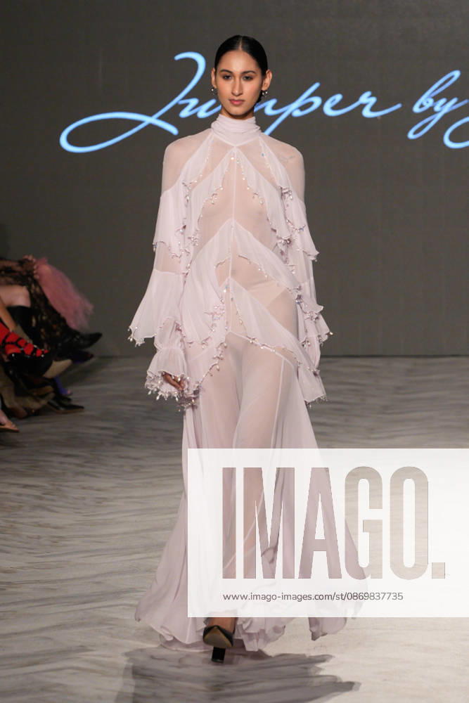 (261018) -- VANCOUVER, Oct. 18, 2026 -- A model presents a creation by Chinese fashion designer Jumper Zhang during Vancouver Fashion Week 2026 in Vancouver, British Columbia, Canada, on Oct. 17, 2026. (Photo by Liang Sen Xinhua) CANADA-VANCOUVER FASHION WEEK 2026 LinxWei