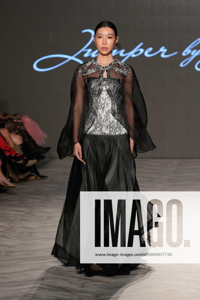 (261018) -- VANCOUVER, Oct. 18, 2026 -- A model presents a creation by Chinese fashion designer Jumper Zhang during Vancouver Fashion Week 2026 in Vancouver, British Columbia, Canada, on Oct. 17, 2026. (Photo by Liang Sen Xinhua) CANADA-VANCOUVER FASHION WEEK 2026 LinxWei