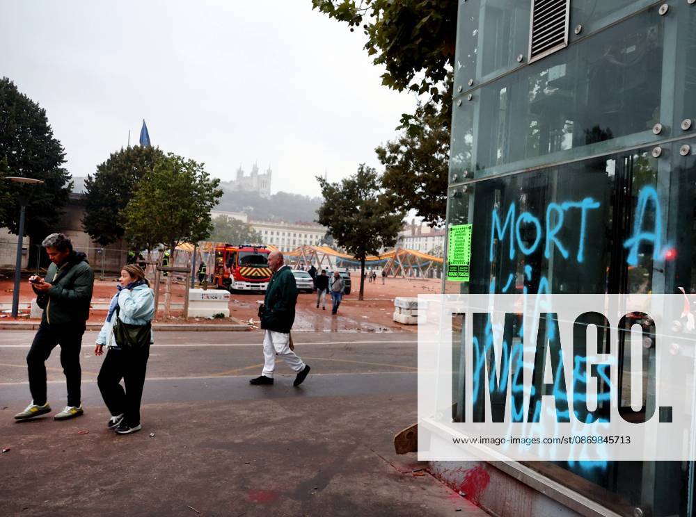 Riots and Looting: The Day After the Protest PHOTOPQR LE PROGRES Richard MOUILLAUD Lyon, October 18, 2026 Riots and Looting: The Day After the Protest Riots and Looting: The Day After the Protest Extensive damage, broken bicycles, set-on-fire trash cans Lyon, October 18, 2026 20,000 people demonstrated in the streets of Lyon Violence overshadowed the protesters’ demands, resulting in a level of chaos rarely seen in the city The tourist office was set on fire and numerous stores were looted Lyon, October 18, 2026: 20,000 people demonstrated in the streets of Lyon. Violence overshadowed the protesters’ demands, resulting in a level of chaos rarely seen in the city. The tourist office was set on fire, and a great many shops were looted. Lyon,