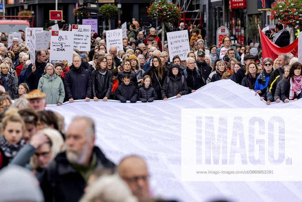 UTRECHT - Participants during a so-called funeral procession to draw attention to the deadly violence against children in Gaza. ROBIN VAN LONKHUIJSEN ANP netherlands out - belgium out