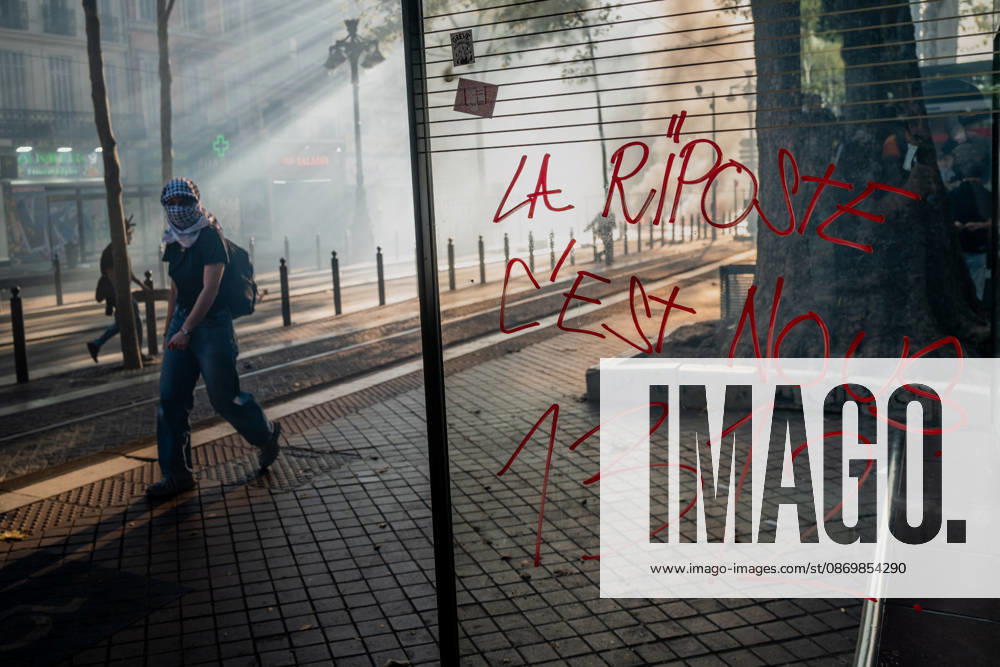 The High Cost of Living Protest - Marseille A tag reading We are the hit back 1312 on a bus shelter, in reference to the Ripost security law passed by the French Parliament in the summer of 2026, during the High Cost of Living Protest demonstration in Marseille, France, on October 17, 2026. Photo by Laurent Coust ABACAPRESS.COM Marseille France