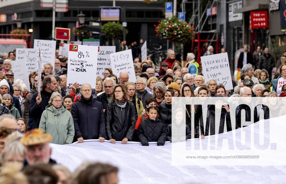 UTRECHT - Participants during a so-called funeral procession to draw attention to the deadly violence against children in Gaza. ROBIN VAN LONKHUIJSEN ANP netherlands out - belgium out