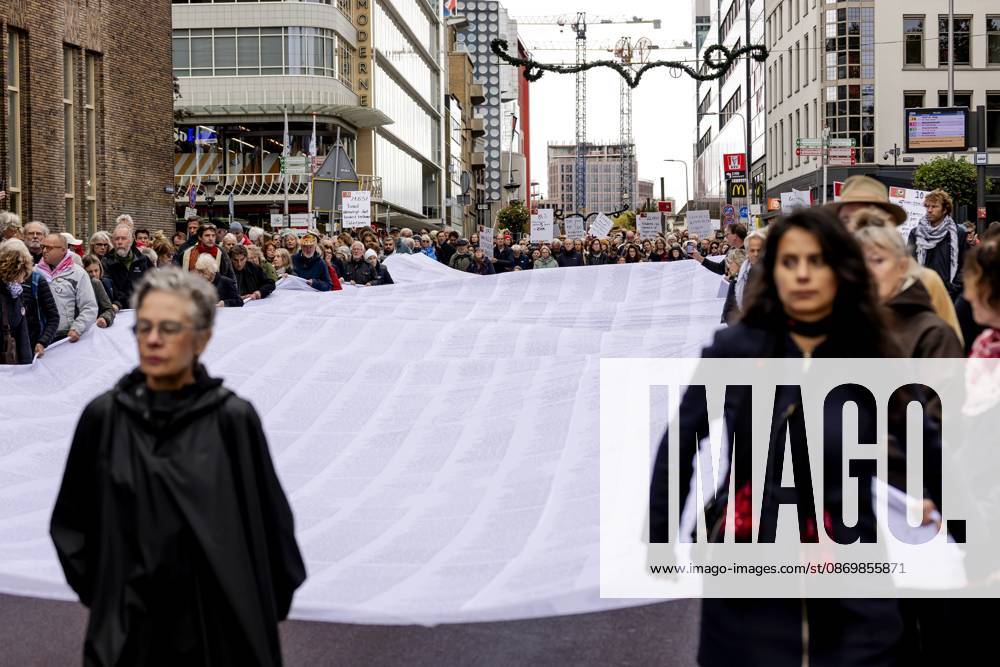 UTRECHT - Participants during a so-called funeral procession to draw attention to the deadly violence against children in Gaza. ROBIN VAN LONKHUIJSEN ANP netherlands out - belgium out