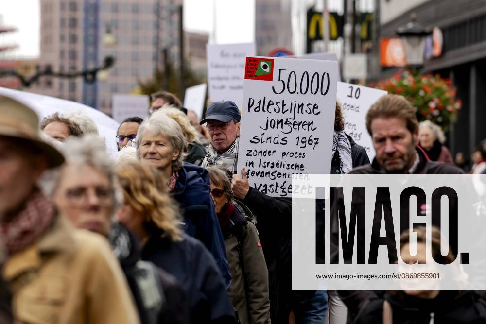 UTRECHT - Participants during a so-called funeral procession to draw attention to the deadly violence against children in Gaza. ROBIN VAN LONKHUIJSEN ANP netherlands out - belgium out