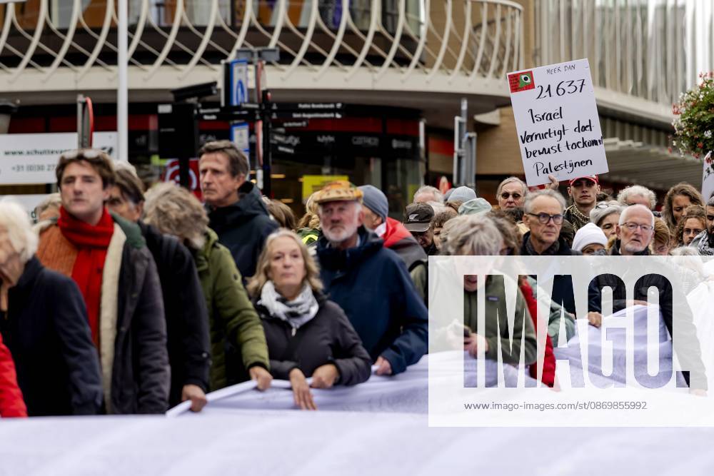 UTRECHT - Participants during a so-called funeral procession to draw attention to the deadly violence against children in Gaza. ROBIN VAN LONKHUIJSEN ANP netherlands out - belgium out