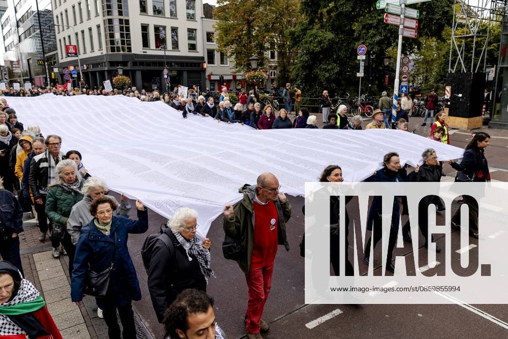 UTRECHT - Participants during a so-called funeral procession to draw attention to the deadly violence against children in Gaza. ROBIN VAN LONKHUIJSEN ANP netherlands out - belgium out