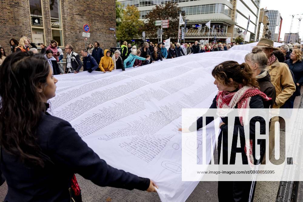 UTRECHT - Participants during a so-called funeral procession to draw attention to the deadly violence against children in Gaza. ROBIN VAN LONKHUIJSEN ANP netherlands out - belgium out