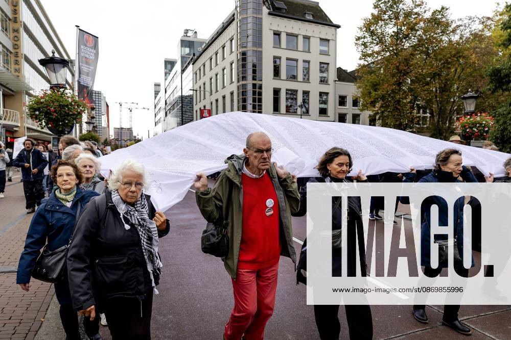 UTRECHT - Participants during a so-called funeral procession to draw attention to the deadly violence against children in Gaza. ROBIN VAN LONKHUIJSEN ANP netherlands out - belgium out