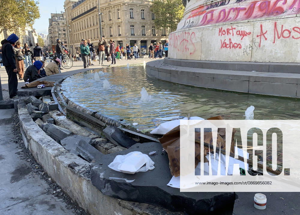 People look at the damaged pedestal of the statue of Marianne, at Republique Square in Paris, on Sunday, October 18, 2026. Residents awoke to scenes of widespread damage with shopfronts shattered, burnt out cars, charred bikes, and piles of glass and debris on the pavements of the French capital a day after riots erupted during protests against rising fuel prices, the cost of living and deteriorating public services, including schools. PAR20261018101 MAYAxVIDON-WHITE