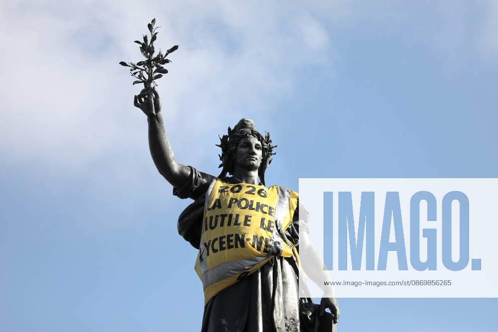 The statue of Marianne is clad in a yellow vest tagged with 2026 : la police mutile les lycà ens , at Republique Square in Paris, on Sunday, October 18, 2026. Residents awoke to scenes of widespread damage with shopfronts shattered, burnt out cars, charred bikes, and piles of glass and debris on the pavements of the French capital a day after riots erupted during protests against rising fuel prices, the cost of living and deteriorating public services, including schools. PAR20261018103 MAYAxVIDON-WHITE