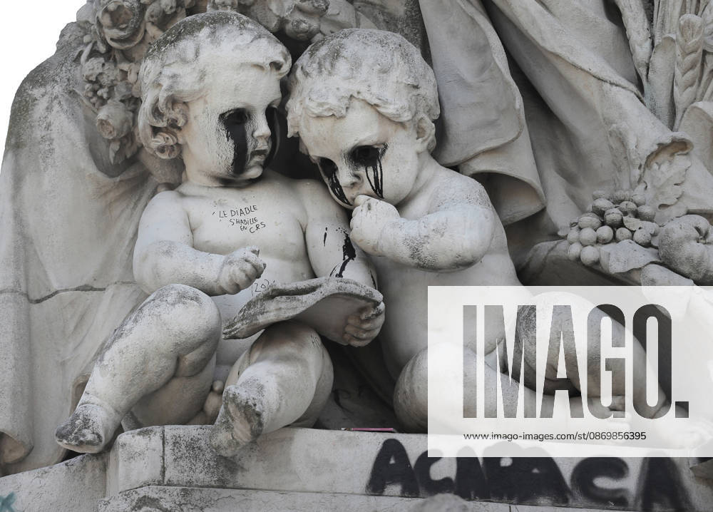 The eyes of the two children symbolizing knowledge at the foot of the statue of Fraternity have been blacked out at Republique Square in Paris, on Sunday, October 18, 2026. Residents awoke to scenes of widespread damage with shopfronts shattered, burnt out cars, charred bikes, and piles of glass and debris on the pavements of the French capital a day after riots erupted during protests against rising fuel prices, the cost of living and deteriorating public services, including schools. PAR202610181051 MAYAxVIDON-WHITE