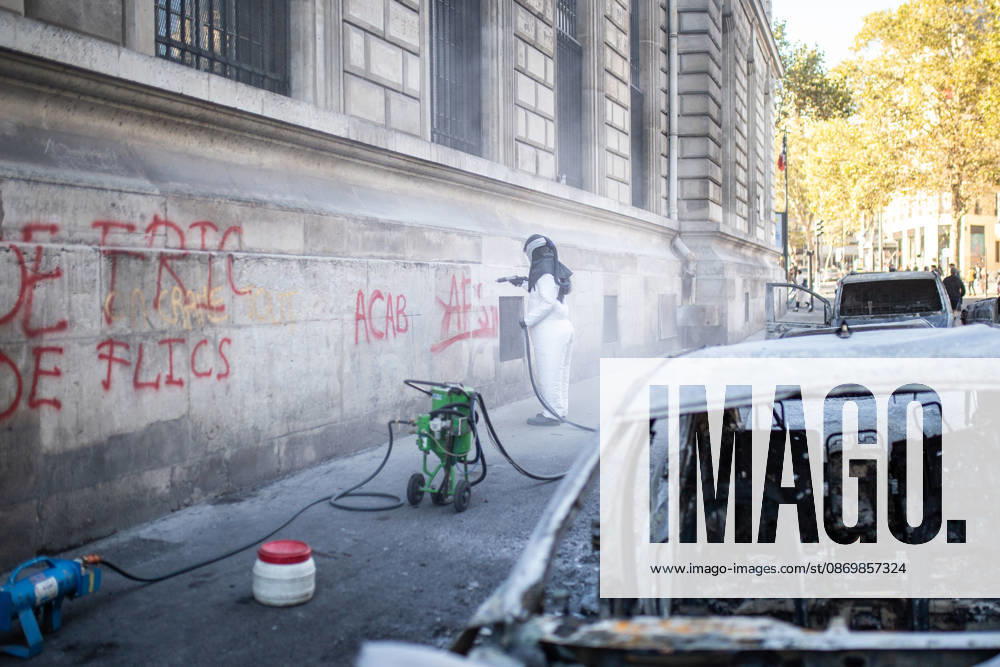 Aftermath of clashes during nationwide protests in Paris PARIS, FRANCE - OCTOBER 18: A worker tries to remove graffiti on a building after a day of violent clashes between police and protesters amid a nationwide mobilisation over rising living costs, fuel prices and education funding in Paris, France, on October 18, 2026. Hesham Elsherif Anadolu Paris France. Editorial use only. Please get in touch for any other usage.