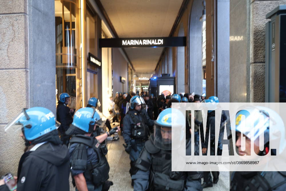 IPA89860581 - Milan: Clashes and looting by hooded youths continued in the city center the day after the demonstration on Saturday, the 17th; many hooded individuals were detained and taken to police headquarters.