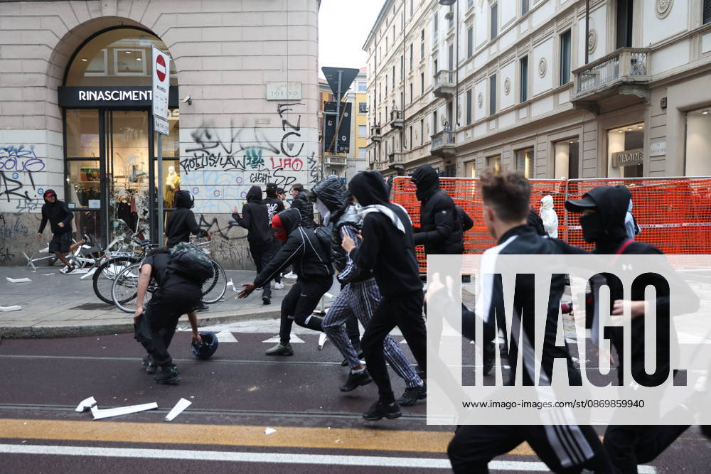 IPA89862203 - Milan: Clashes and looting by hooded youths continued in the city center the day after the demonstration on Saturday, the 17th; many hooded individuals were detained and taken to police headquarters.