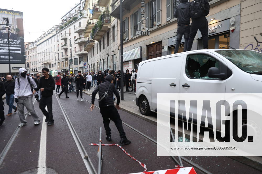 IPA89862226 - Milan: Clashes and looting by hooded youths continued in the city center the day after the demonstration on Saturday, the 17th; many hooded individuals were detained and taken to police headquarters.